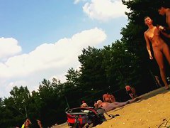 Naked valley at the nudist beach with girls and audlts