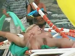 Mature babe with big tits and hairy pussy naked at the beach