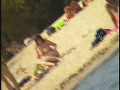 College nudist sluts on hidden beach voyeur vid