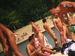 Extreme models with beverages on the nude beach voyeur video