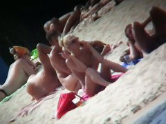 Nudist beach voyeur cannot get enough of a sexy blonde