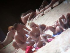 Nudist beach voyeur cannot get enough of a sexy blonde