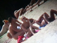 Nudist beach voyeur cannot get enough of a sexy blonde