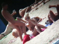 Nudist beach voyeur cannot get enough of a sexy blonde
