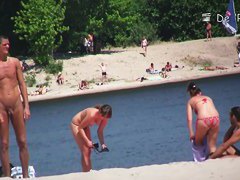 Perfect day with nude girls on the hot summer beach