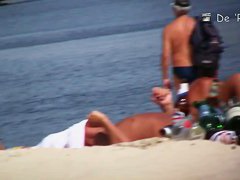 Perfect day with nude girls on the hot summer beach