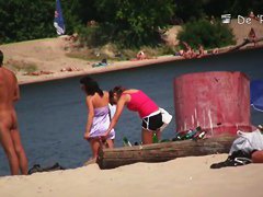 Perfect day with nude girls on the hot summer beach