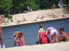 Perfect day with nude girls on the hot summer beach