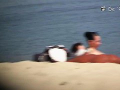 Xxx beach porno vid of some topless women apply tanning lotion