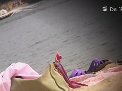 Beach spy cam catching the nude bodies of resting people