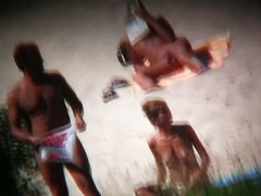 Hot ladies with cool butts and small boobs relaxing on the beach