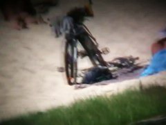 Hot ladies with cool butts and small boobs relaxing on the beach