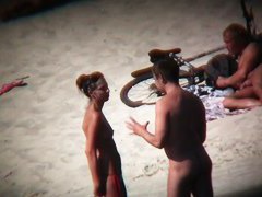 Hot ladies with cool butts and small boobs relaxing on the beach