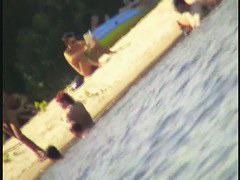 A horny voyeur loves filming hot nudity on the beach.