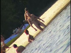 A horny voyeur loves filming hot nudity on the beach.