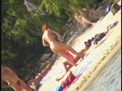 A horny voyeur loves filming hot nudity on the beach.