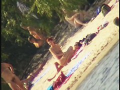 A horny voyeur loves filming hot nudity on the beach.