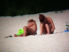 Hot babes filmed on beach by a voyeur