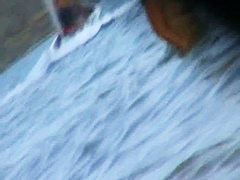 Fat ass big boobed woman is swimming at the summer beach