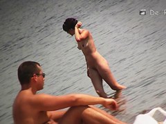 Voyeur beach shots of amateur people sunbathing nude