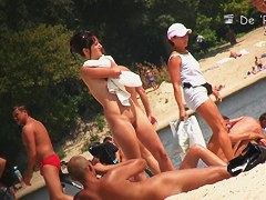 Voyeur beach shots of amateur people sunbathing nude