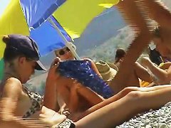 Skillful voyeur smuggled a camera to a nudist beach