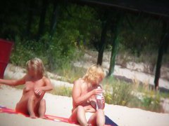 Blond chicks on the beach topless