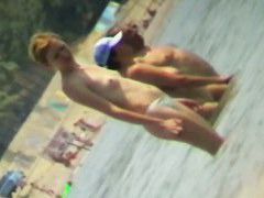 Beach voyeur hunting attractive nudist cooling in the sea