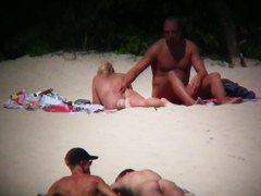 Hot couple caught on a nude beach spy cam vid