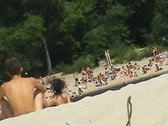 Hot naked women filmed by a nude beach voyeur