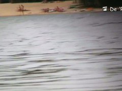 Hot blokes and sexy chicks tanning their bodied on the nudist beach