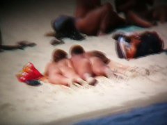 naked and hot on the beach bits of flesh hanging out everywhere