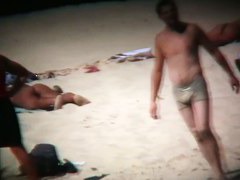 naked and hot on the beach bits of flesh hanging out everywhere