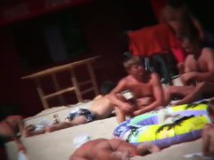 naked and hot on the beach bits of flesh hanging out everywhere