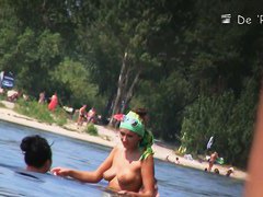 A stirring nude beach voyeur video