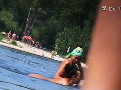 A stirring nude beach voyeur video