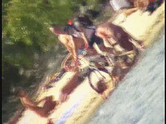 My beach spy cam video of a cute redhead coming out of the water
