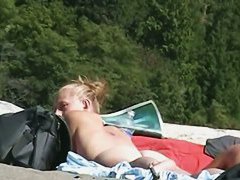 Blonde milfs and teens enjoying the the sun on a nude beach
