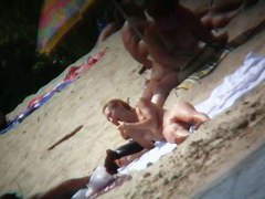 Beach voyeur vid of hippy blonde chick nude sunbathing