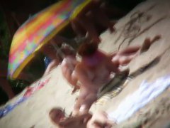 Beach voyeur vid of hippy blonde chick nude sunbathing