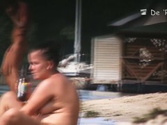 Fat amateur sits on beach voyeur cam with huge naked boobs