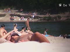 Nudist girl is lying showing the stretched slit to public