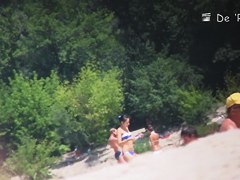 Nudist girl is lying showing the stretched slit to public