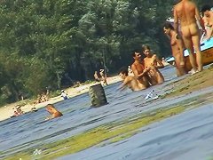 Russian nudist beach with couples sunbathing sweet