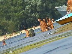 Russian nudist beach with couples sunbathing sweet