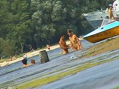 Russian nudist beach with couples sunbathing sweet
