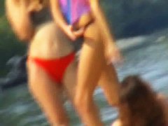 Voyeur cam catches girls filming themselves on the beach