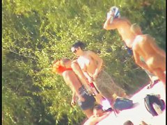 Busty nudist beach MILF caught on a hidden cam