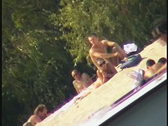 Busty nudist beach MILF caught on a hidden cam