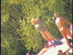 Busty nudist beach MILF caught on a hidden cam